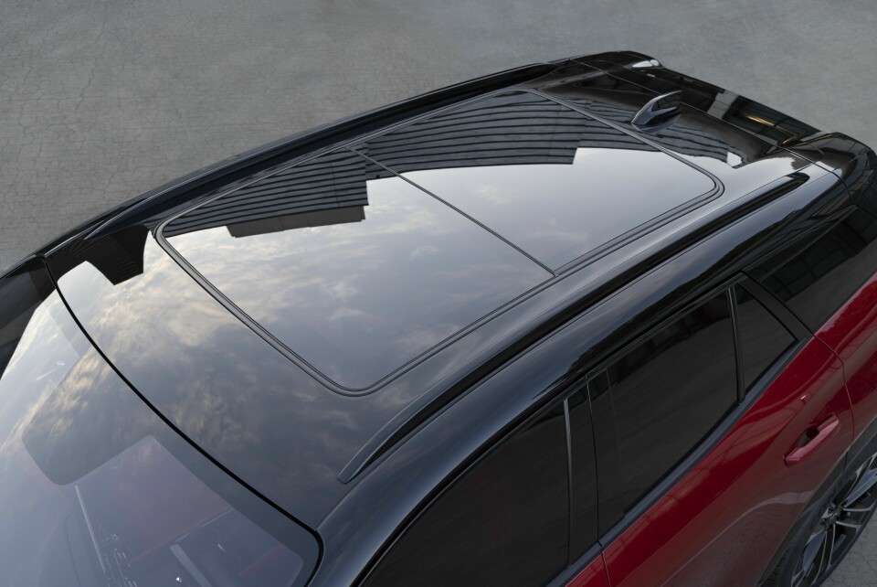 Overhead view of black sunroof on 2024 Chevrolet Blazer EV SS in Radiant Red Tintcoat. Preproduction model shown. Actual production model may vary. 2024 Chevrolet Blazer EV available Spring 2023.