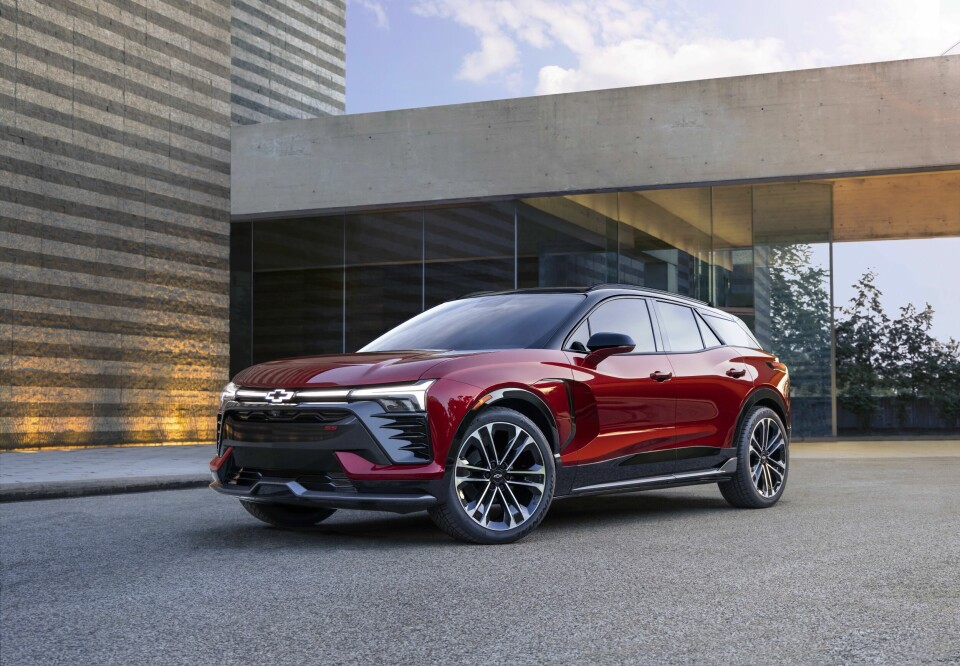 Seven-eighths view of 2024 Chevrolet Blazer EV RS in Radiant Red Tintcoat. Preproduction model shown. Actual production model may vary. 2024 Chevrolet Blazer EV available Spring 2023.