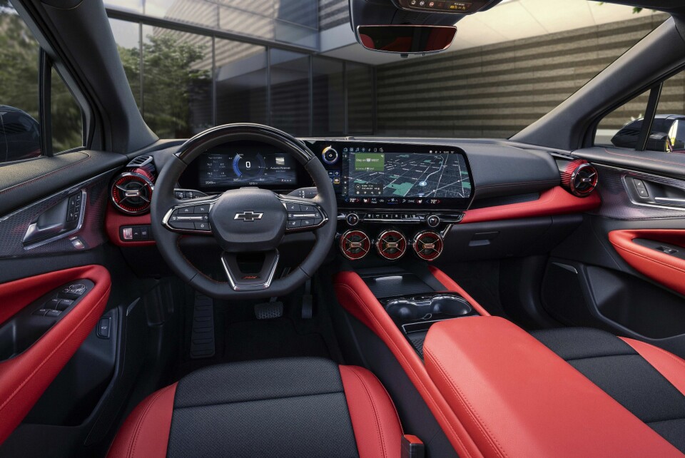 Wide view of front cabin in 2024 Chevrolet Blazer EV SS with Adrenaline Red and Blacken Black interior and Adrenaline Red accents. Preproduction model shown. Actual production model may vary. 2024 Chevrolet Blazer EV available Spring 2023.