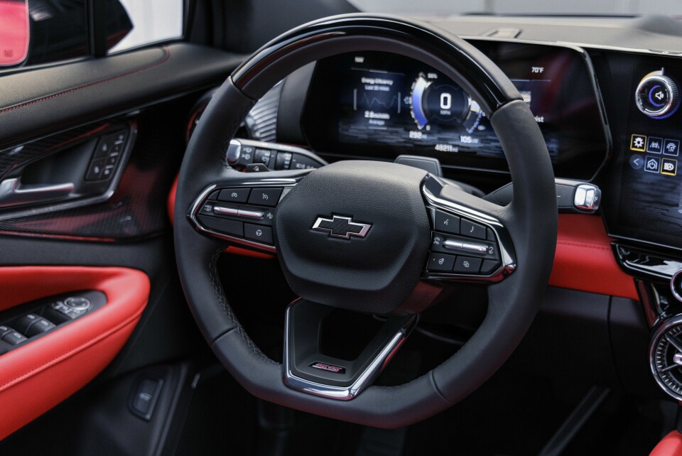 Front view of steering wheel on 2024 Chevrolet Balzer EV SS in Radiant Red Tintcoat with Adrenaline Red interior. Preproduction model shown. Actual production model may vary. 2024 Chevrolet Blazer EV available Spring 2023.