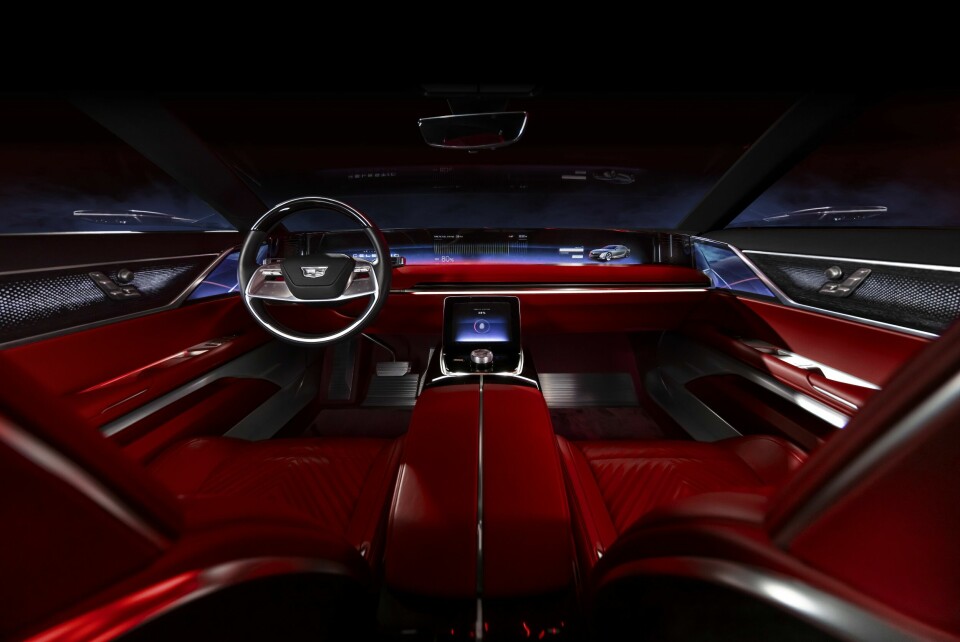 Interior view of the steering wheel, 55-inch pillar-to-pillar advanced LED screen, center console and front seats of the CELESTIQ show car. Show car images displayed throughout (not for sale).