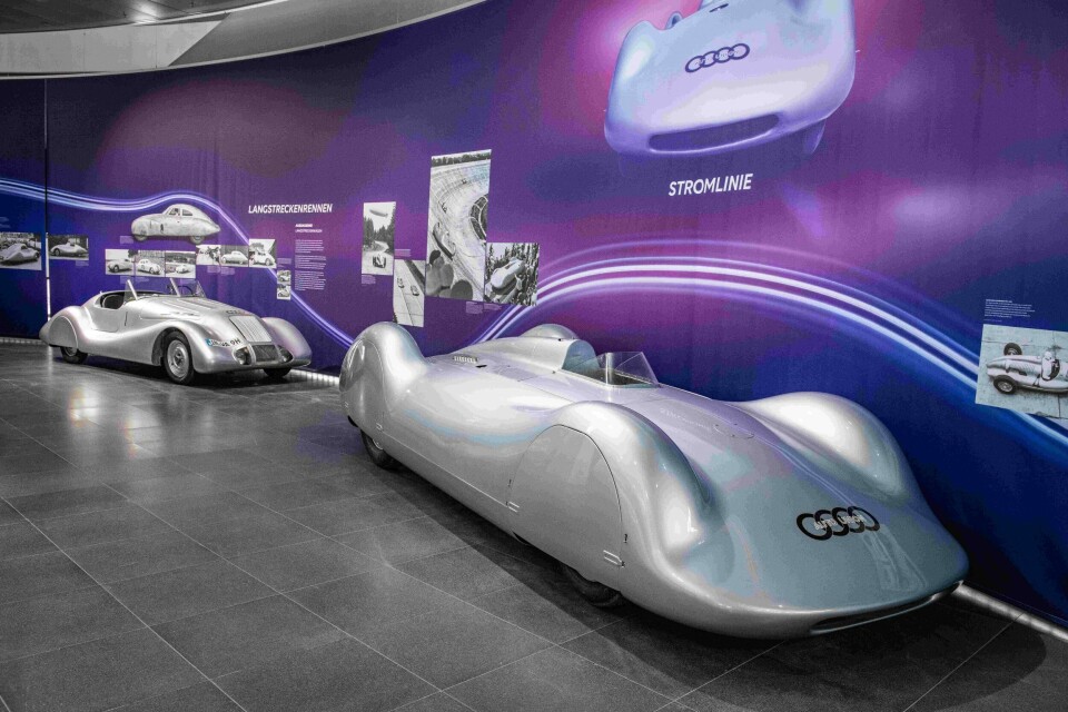 From November 18, 2023, to June 9, 2024, Audi Tradition will take all those interested in technology on a journey through the history of aerodynamics and show the beginnings of aerodynamic concepts in automotive engineering up to 1945 in the Windschnittig exhibition at Audi museum mobile. A look inside the exhibition: the Auto Union Type C Stromlinie (German for streamline) racing car from the historical vehicle collection of AUDI AG and other exhibits.