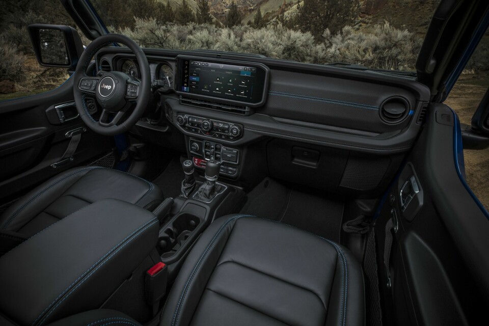New 2024 Jeep® Wrangler Rubicon X 4xe with 12-way power adjustable front seats and all-new instrument panel featuring Uconnect 5 system with best-in-class 12.3-inch touchscreen radio
